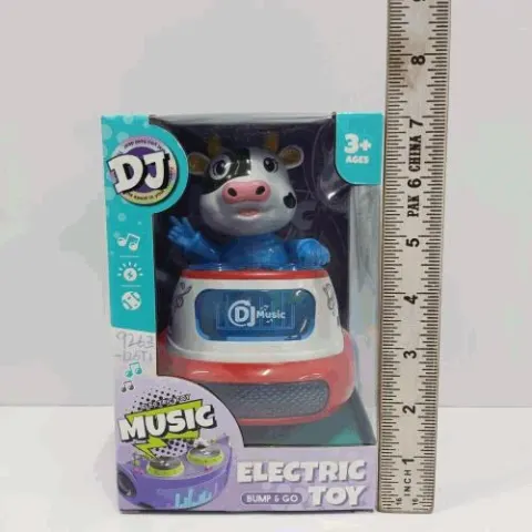 DJ Electric Musical Dancing Cow Toy